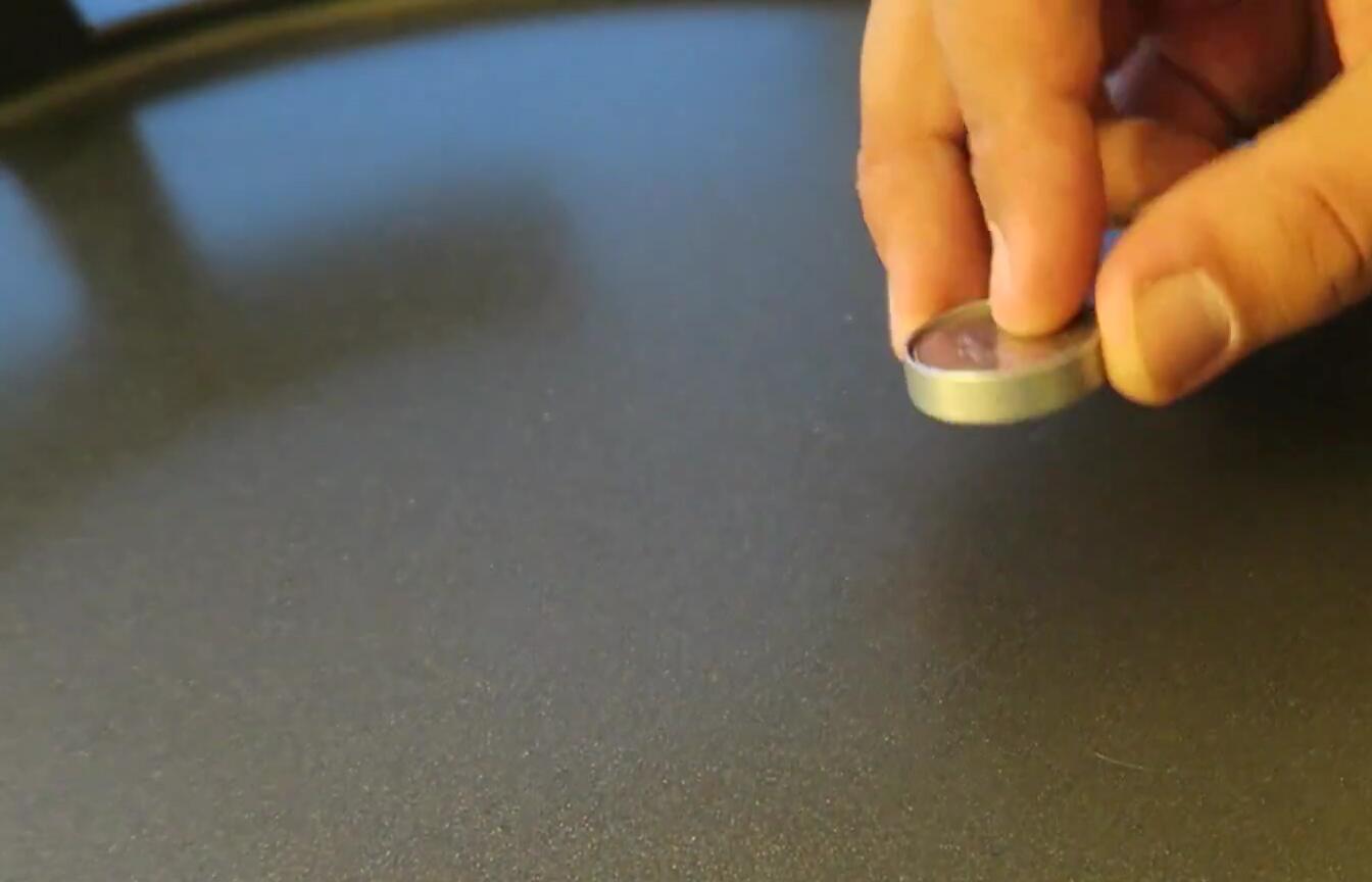 The Covert Coin opened to reveal the hidden compartment.