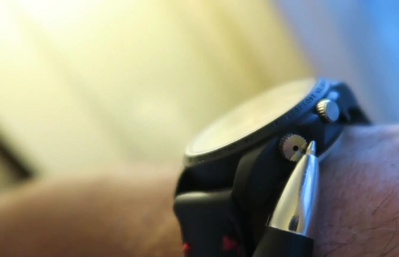 Close-up of the watch showing the hidden camera lens.