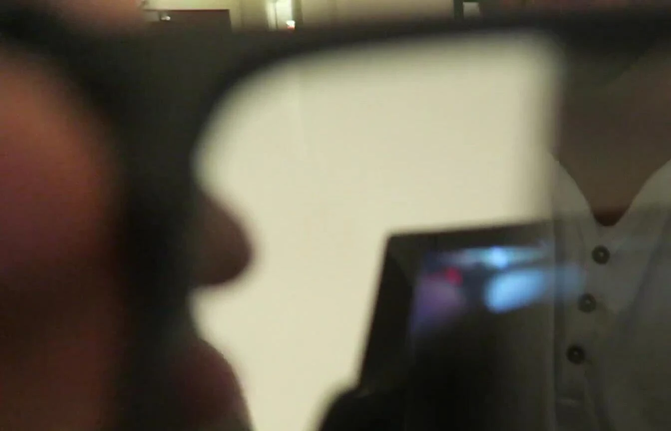 Demonstrating the glasses' ability to see behind.