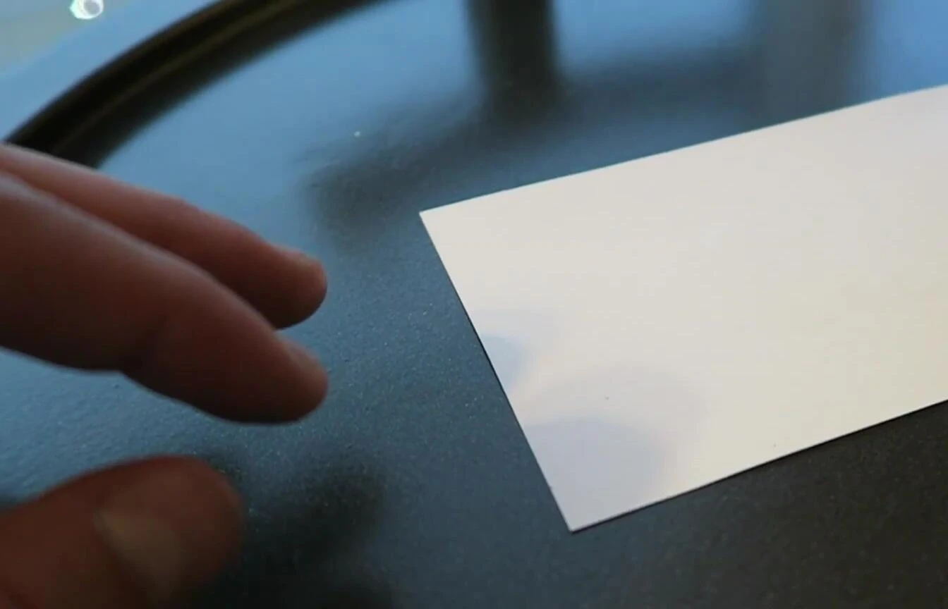 The spy pen illuminating a secret message.