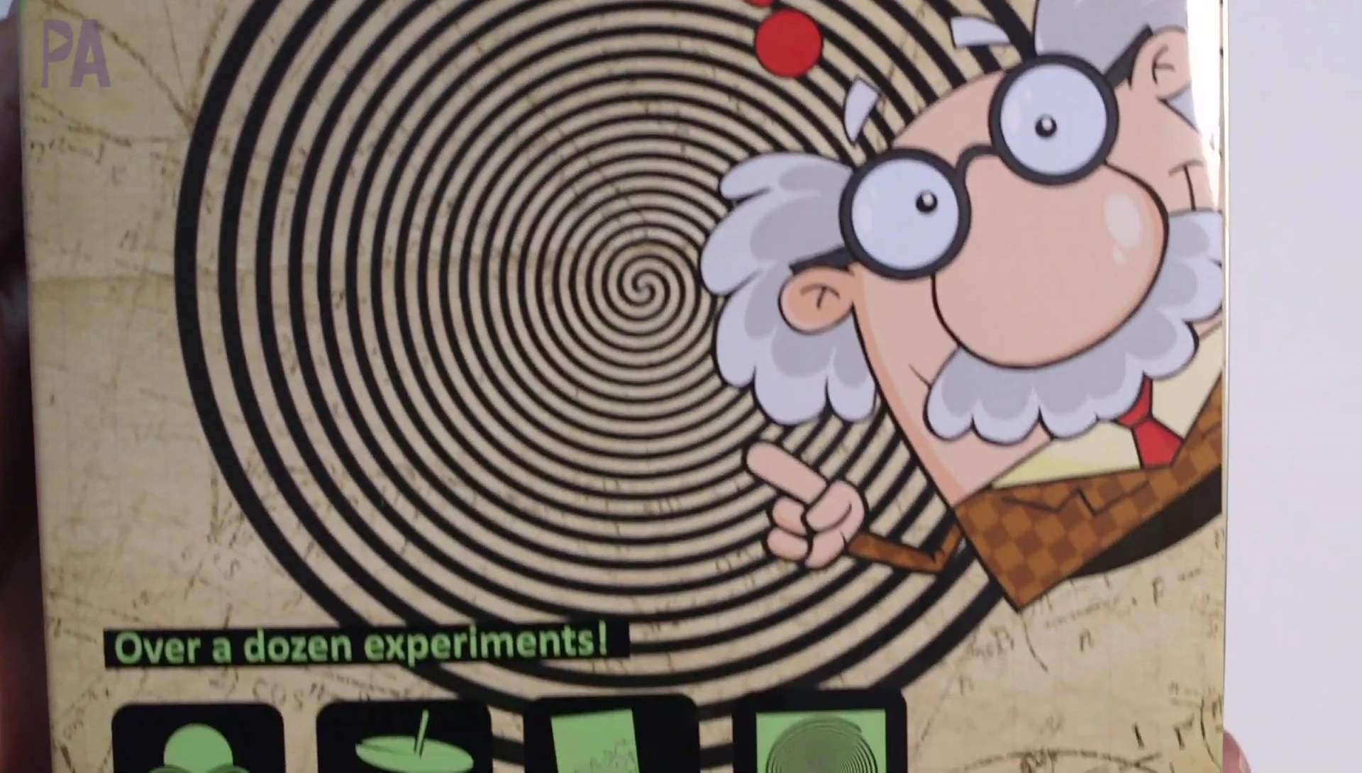 The instruction booklet with examples of optical illusions