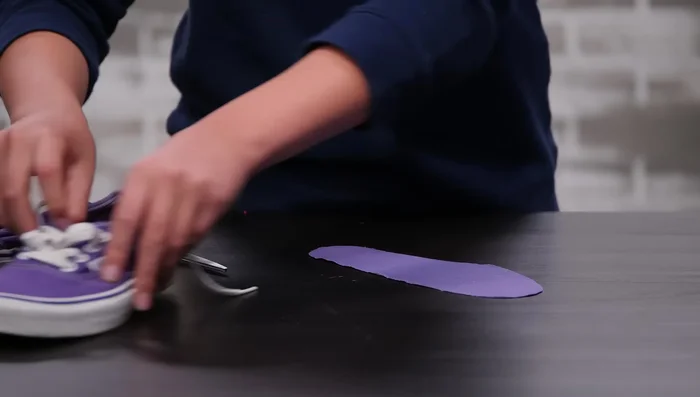 Place the fake sole back into the shoe, fabric side up.