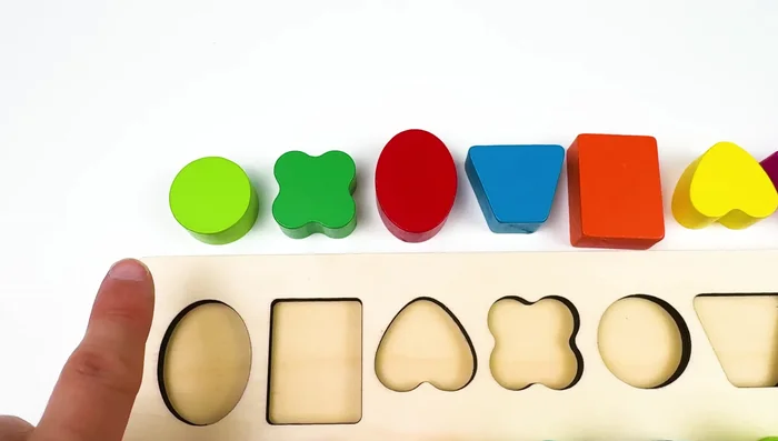 Place shapes into corresponding spaces.
